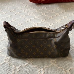 Vintage Louis Vuitton travel bag.  Damage